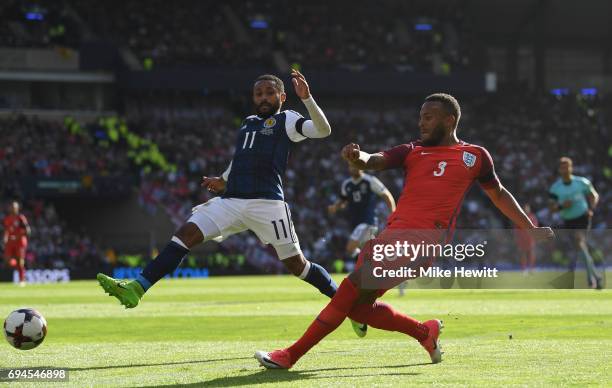 Ryan Bertrand of England crosses the ball as Ikechi Anya of Scotland attempts to block during the FIFA 2018 World Cup Qualifier between Scotland and...