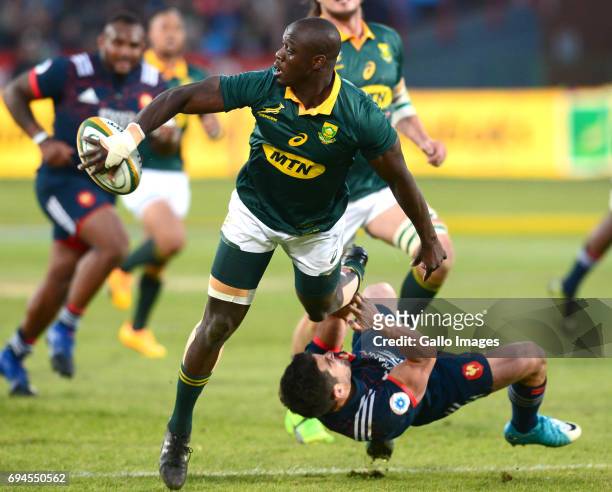 Raymond Rhule of the Springboks tackled by Brice Dulin of the French during the Castle Lager Incoming Series 1st Test between South Africa and France...