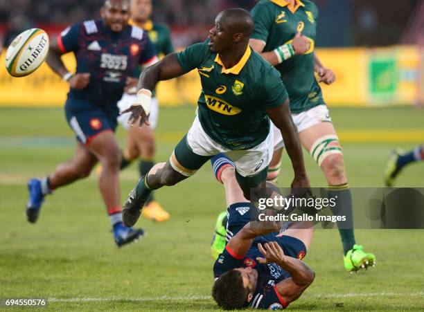 Raymond Rhule of the Springboks tackled by Brice Dulin of the French during the Castle Lager Incoming Series 1st Test between South Africa and France...