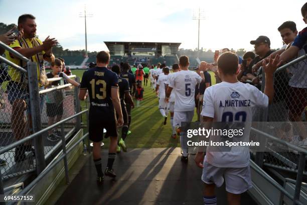 The starters for both teams march onto the field. The North Carolina Football Club hosted the Charlotte Independence on May 31 at Sahlen's Stadium at...