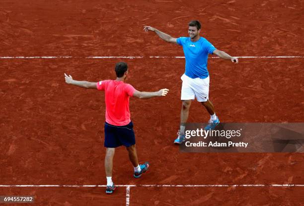 Ryan Harrison of The United States and partner Michael Venus of New Zealand celebrate victory in the mens doubles final match against Donald Young of...