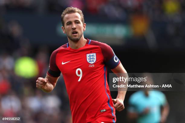 Harry Kane of England in action during the FIFA 2018 World Cup Qualifier between Scotland and England at Hampden Park National Stadium on June 10,...