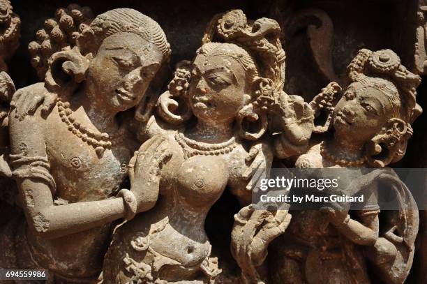 an intricate sculpture depicting hindi deities at the harshat mata temple in the village of abhaneri, rajasthan, india - abhaneri stock-fotos und bilder