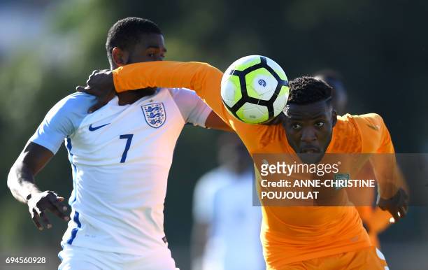 England's Japhet Tanganga vies with Ivory Coast's Juvenal Agnero during the Under 21 international football final match England vs Ivory Coast, at...