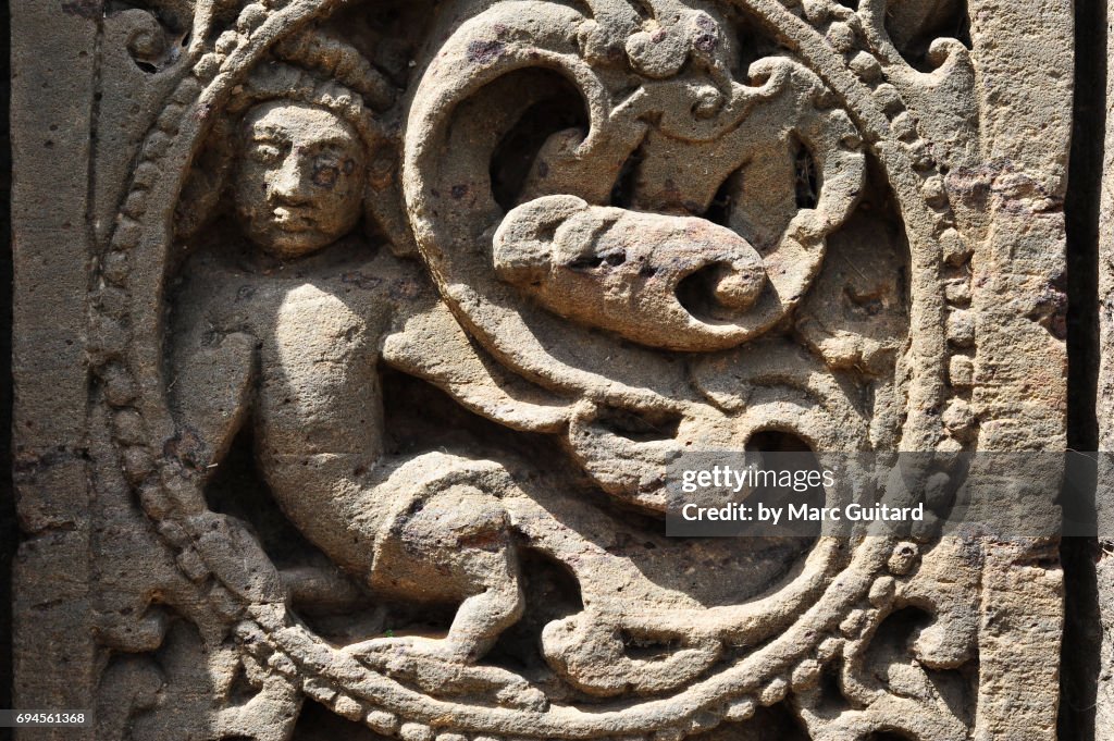 An intricate sculpture depicting Hindi deities at the Harshat Mata Temple in the village of Abhaneri, Rajasthan, India