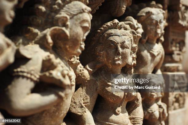 an intricate sculpture depicting hindi deities at the harshat mata temple in the village of abhaneri, rajasthan, india - abhaneri fotografías e imágenes de stock