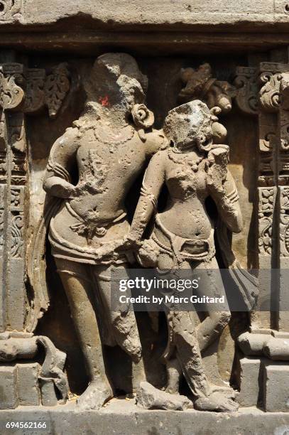an intricate sculpture depicting hindi deities at the harshat mata temple damaged by muslim invaders in the village of abhaneri, rajasthan, india - abhaneri foto e immagini stock