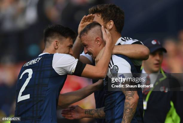 Leigh Griffiths of Scotland celebrates scoring his sides second goal with his Scotland team mates during the FIFA 2018 World Cup Qualifier between...