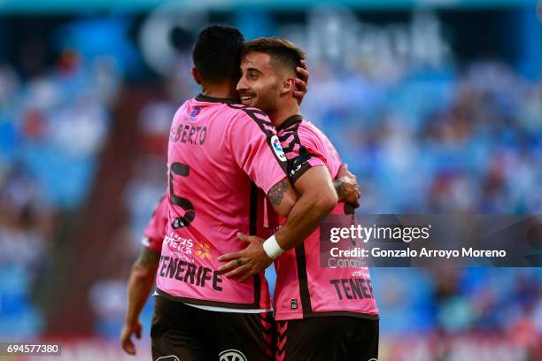 Omar Perdomo of CD Tenerife celebrates scoring their opening goal with teammate Alberto Jimenez during the La Liga 2 match between Real Zaragoza and...