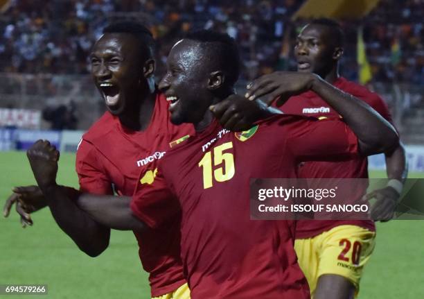 Guinea National football team players celebrate their goal during the 2019 African Cup of Nations qualifyer football match between Ivory Coast and...