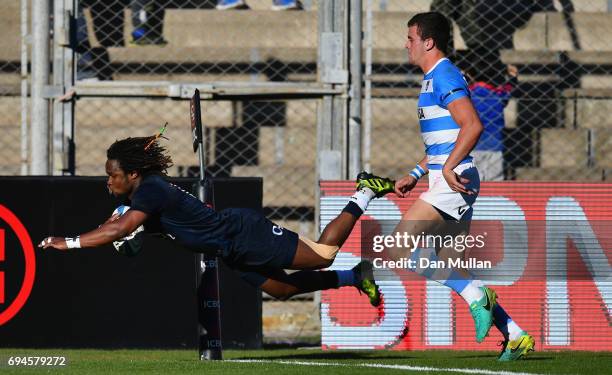 Marland Yarde of England scores England's first try during the International Test match between Argentina and England at Estadio San Juan del...