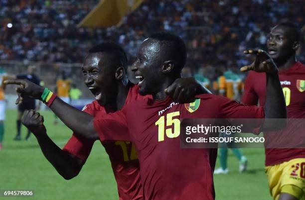 Guinea National football team players Naby Deco Keita and Alkhaly Bangoura celebrates their goal during the 2019 African Cup of Nations qualifyer...