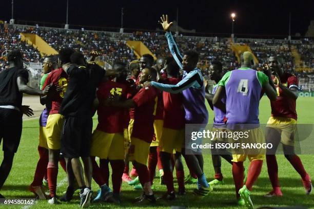 Guinea National football team players celebrate their goal during the 2019 African Cup of Nations qualifyer football match between Ivory Coast and...