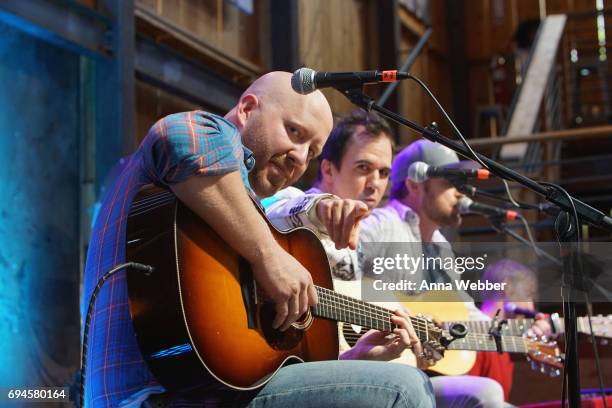 Brent Anderson, J.T. Harding, Ben Glover and Ashley Gorley perform onstage for the ASCAP Writers Round at the HGTV Lodge during CMA Music Fest on...