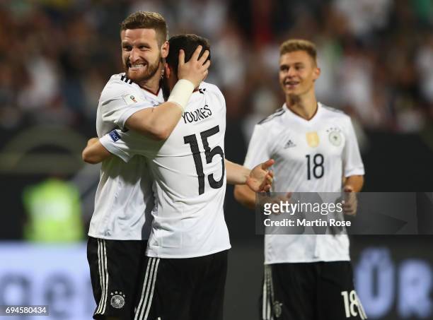 Shkodran Mustafi of Germany celebrates scoring his sides fifth goal with his Germany team mates during the FIFA 2018 World Cup Qualifier between...