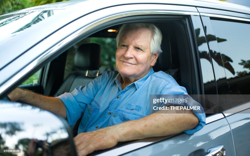 Senior man in a car
