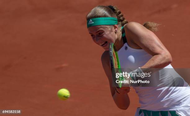 Jelena Ostapenko of Latvia returns the ball to Simona Halep of Romania during the womens final at Roland Garros Grand Slam Tournament - Day 14 on...