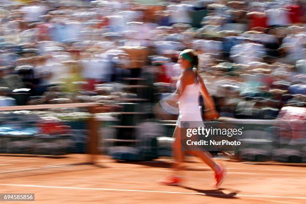 Jelena Ostapenko of Latvia celebrates victory in the ladies singles final match against Simona Halep of Romania on day fourteen of the 2017 French...