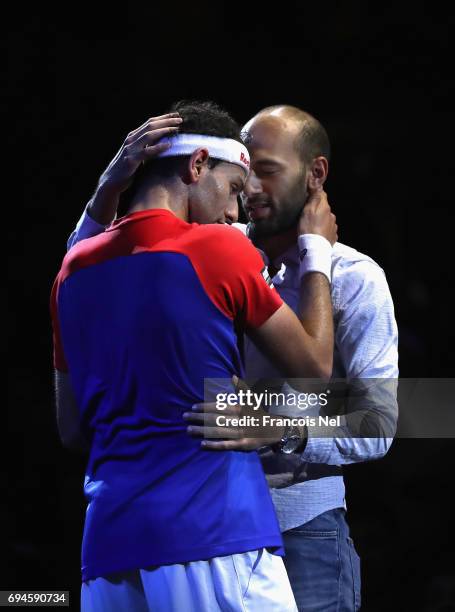 Mohamed El Shorbagy of Egypt is is congratulated by his brother Marwan El Shorbagy of Egypt after winning the Men's final match of the PSA Dubai...