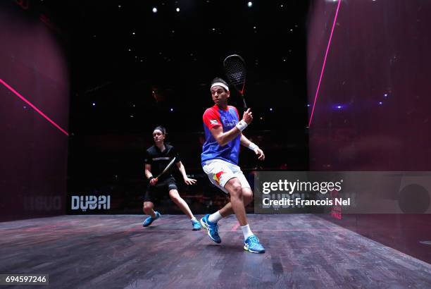 Mohamed El Shorbagy of Egypt competes against James Willstrop of England during the Men's final match of the PSA Dubai World Series Finals 2017 at...