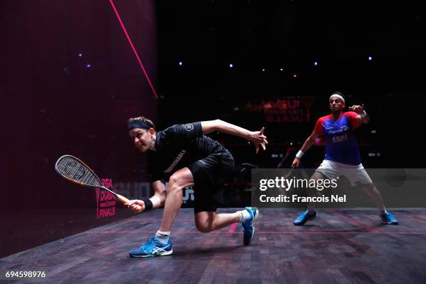 James Willstrop of England competes against Mohamed El Shorbagy of Egypt during the Men's final match of the PSA Dubai World Series Finals 2017 at...