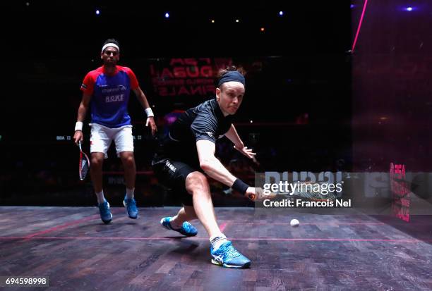 James Willstrop of England competes against Mohamed El Shorbagy of Egypt during the Men's final match of the PSA Dubai World Series Finals 2017 at...