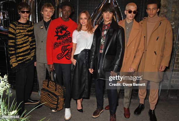 Stella McCartney poses with models at a celebration of the Stella McCartney AW17 collection and film launch at Ye Olde Mitre on June 10, 2017 in...