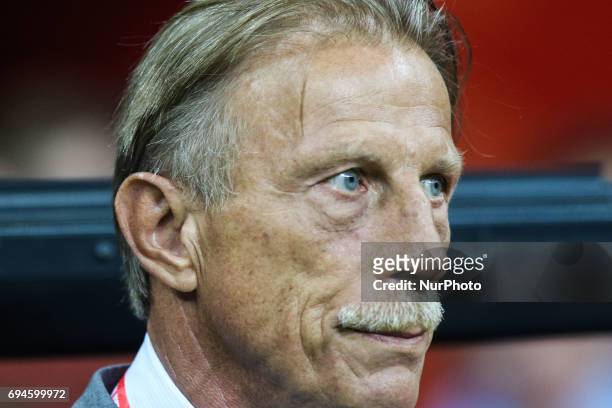 Romania's head coach Christoph Daum attends the FIFA World Cup 2018 qualification football match between Poland and Romania in Warsaw, Poland on June...
