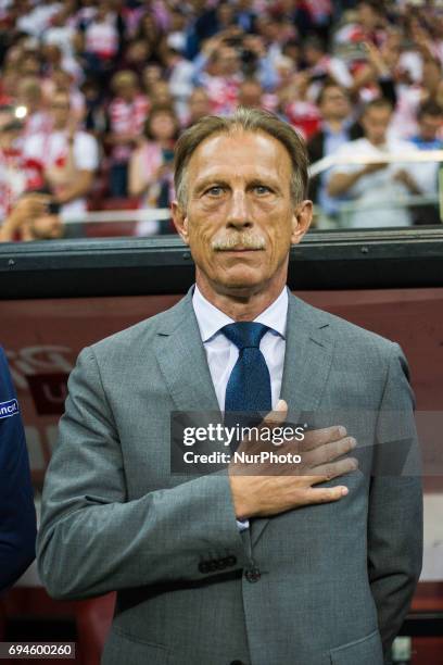 Romania's head coach Christoph Daum attends the FIFA World Cup 2018 qualification football match between Poland and Romania in Warsaw, Poland on June...