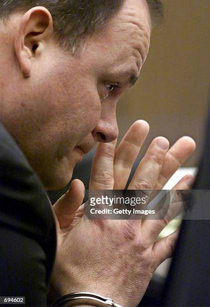 Hockey dad Thomas Junta cries while his attorney reads a letter that Junta wrote to his daughter Kendall about his crime during Juntas sentencing...