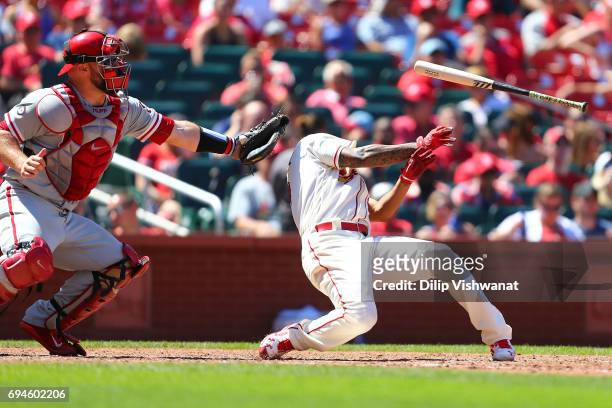 Starter Carlos Martinez of the St. Louis Cardinals is hit by a pitch as Cameron Rupp of the the Philadelphia Phillies catches in the seventh inning...