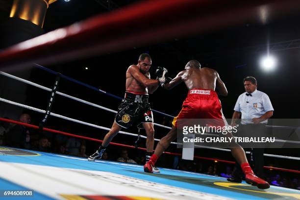 France's Karim Aliliche fights against France's Souleymane MBaye during the "Boxing For Legend" event, on June 10 in Deauville, northwestern France....