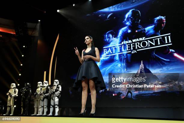 Actress Janina Gavankar introduces 'Star Wars Battlefront 2' as she speaks during the Electronic Arts EA Play event at the Hollywood Palladium on...