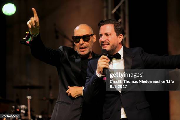 Michel Comte and Rafael Schwarz speak at the Life Ball 2017 Gala Dinner at City Hall on June 10, 2017 in Vienna, Austria.