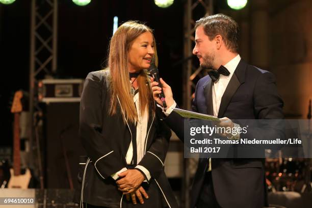 Eva Cavalli and Rafael Schwarz speak at the Life Ball 2017 Gala Dinner at City Hall on June 10, 2017 in Vienna, Austria.