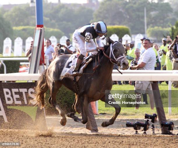 Tapwrit with Jose Ortiz up wins the 149th running of the Belmont Stakes at Belmont Park on June 10, 2017 in Elmont, New York.