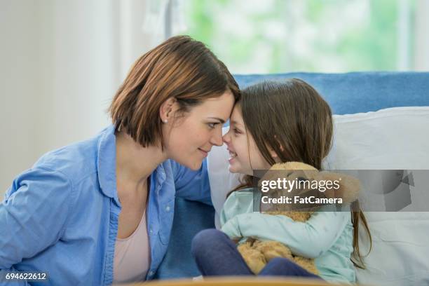 mother and daughter - child having medical bones stock pictures, royalty-free photos & images
