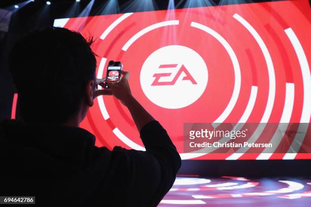 Fan takes photos during the Electronic Arts EA Play event at the Hollywood Palladium on June 10, 2017 in Los Angeles, California. The E3 Game...