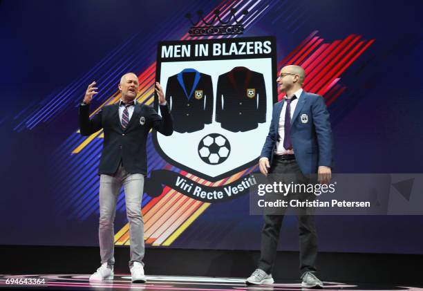 Men In Blazers' show hosts Michael Davies and Roger Bennett speak on stage during the Electronic Arts EA Play event at the Hollywood Palladium on...