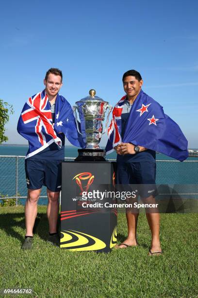 Michael Morgan of Australia and Jason Taumalolo of New Zealand pose with the Rugby League World Cup during a 2017 Rugby League World Cup Media...