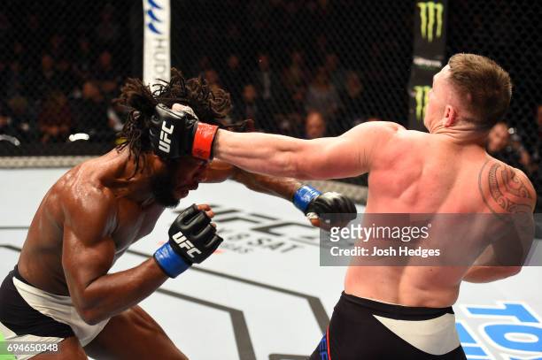 Luke Jumeau of Australia punches Dominique Steele in their welterweight fight during the UFC Fight Night event at the Spark Arena on June 11, 2017 in...