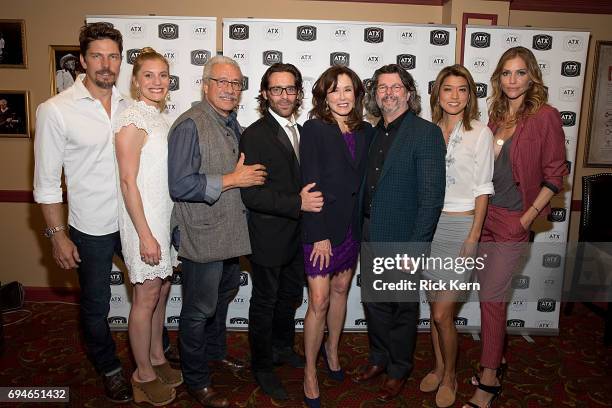 Michael Trucco, Katee Sackhoff, Edward James Olmos, James Callis, Mary McDonnell, Ronald D. Moore, Grace Park, and Tricia Helfer attend the closing...