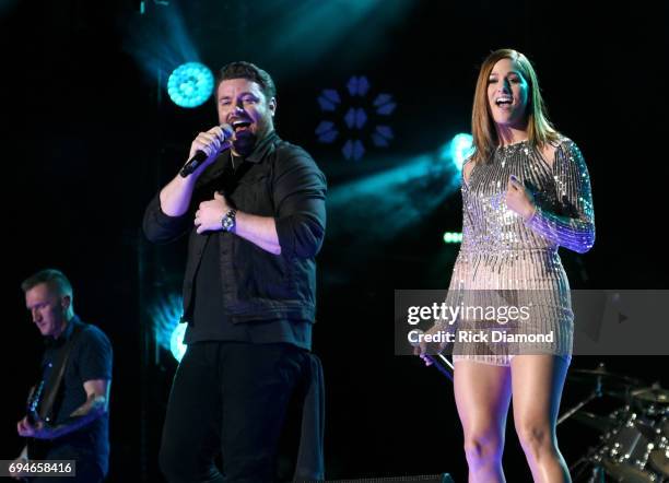 Musical artists Chris Young and Cassadee Pope perform onstage during day 3 of the 2017 CMA Music Festival on June 10, 2017 in Nashville, Tennessee.