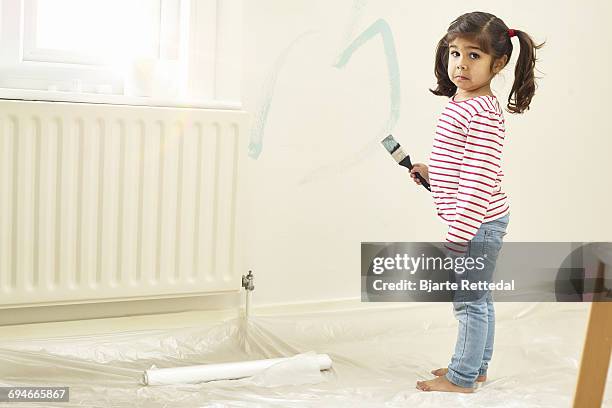 girl with paint brush - bjarte rettedal stock pictures, royalty-free photos & images