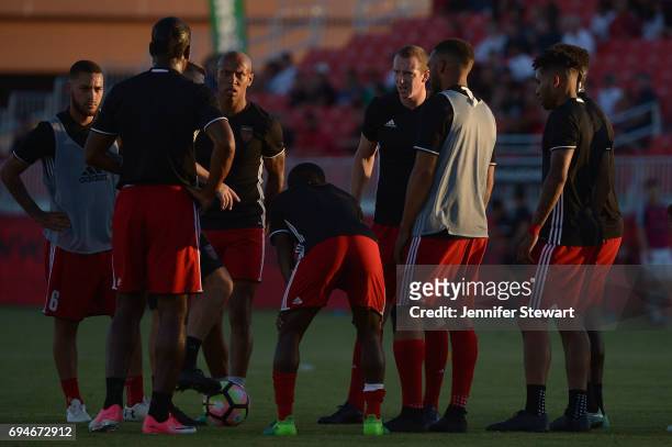 Members of the Phoenix Rising FC stand on the field prior to the game against the Vancouver Whitecaps II at Phoenix Rising Soccer Complex on June 10,...