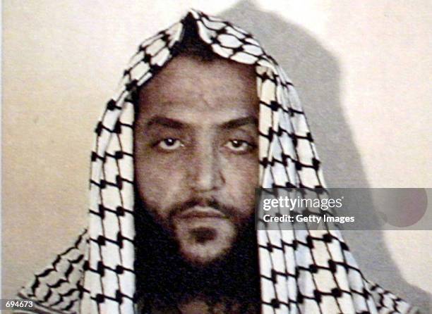 This photo from an FBI wanted poster presented by US Attorney General John Ashcroft shows Al Rauf Bin Al Habib Bin Yousef Al-Jiddi January 25, 2002...