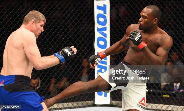 Derek Brunson kicks Daniel Kelly of Australia in their middleweight fight during the UFC Fight Night event at the Spark Arena on June 11, 2017 in...