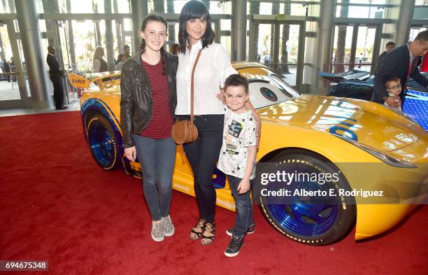 Gemma Beason, actor Catherine Bell, and Ronan Beason pose at the World Premiere of Disney/Pixars Cars 3" at the Anaheim Convention Center on June...