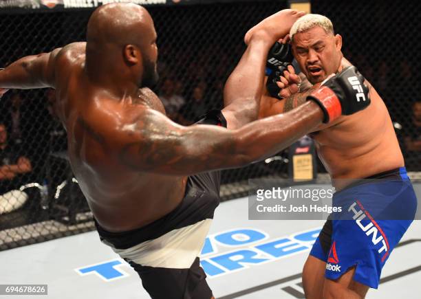 Derrick Lewis lands a kick to the head of Mark Hunt of New Zealand in their heavyweight fight during the UFC Fight Night event at the Spark Arena on...