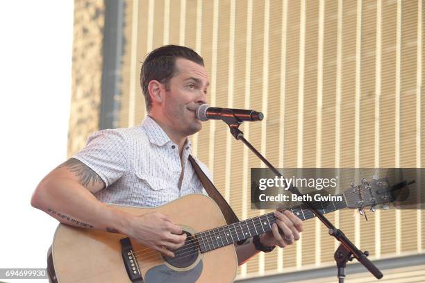 Ryan Kinder performs on the Cracker Barrel stage during CMA fest on June 10, 2017 in Nashville, Tennessee.